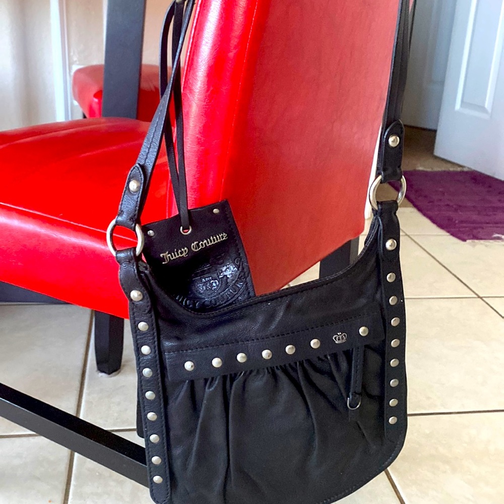 Black leather crossbody bag. Like NEW only worn twice. Great small bag